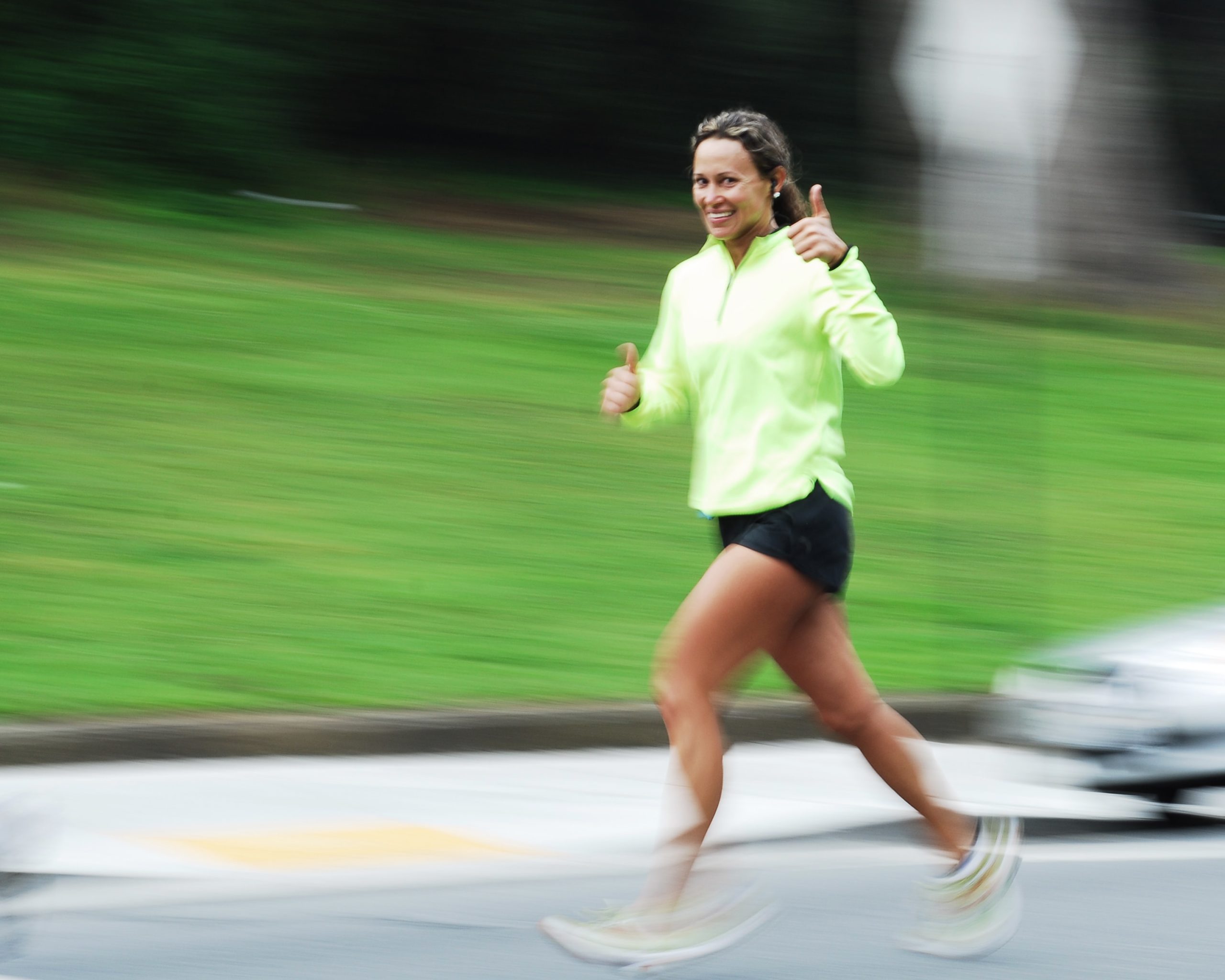 This lady is jogging and knows that exercise reduces future depression.